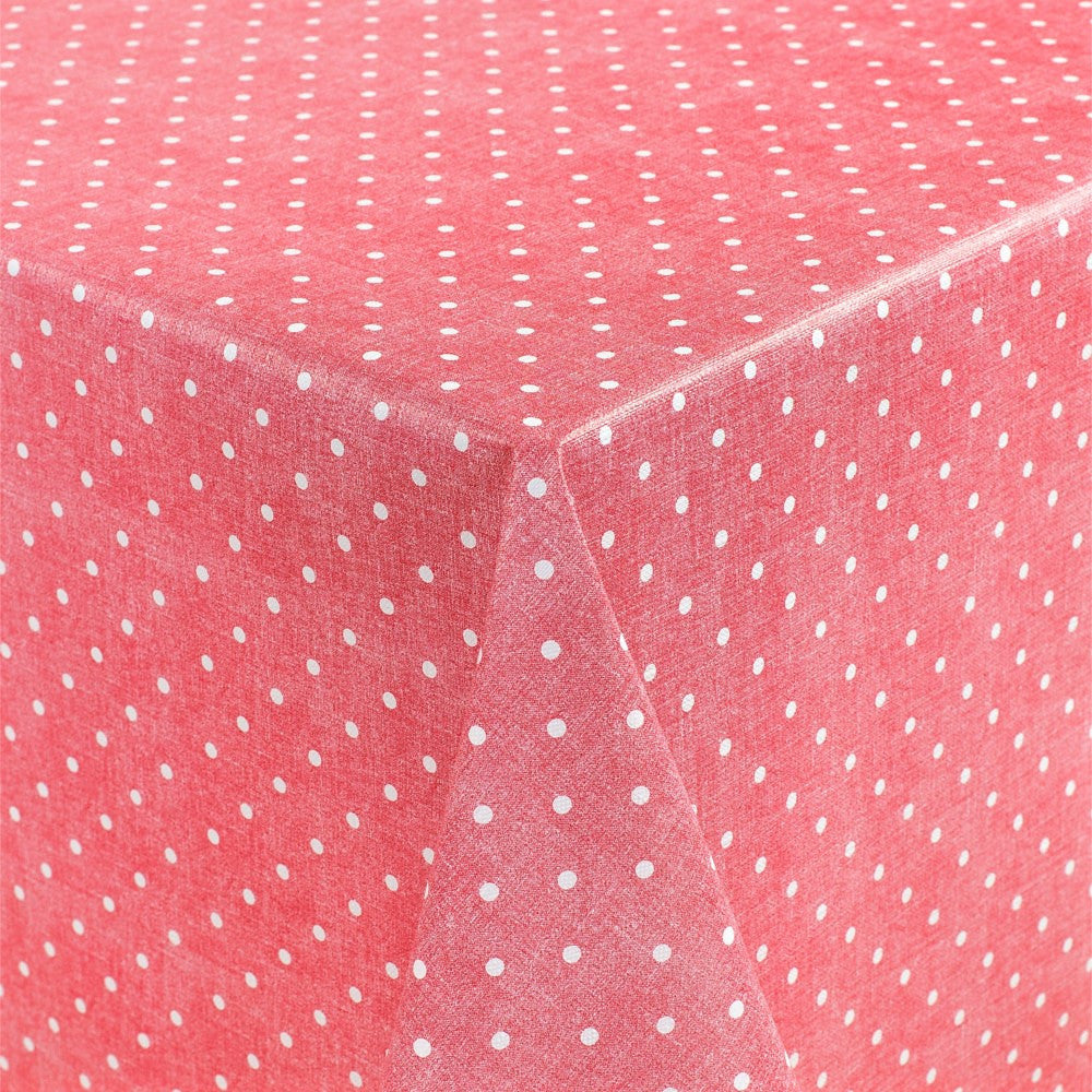 Polkaprikker på rød/rosa bakgrunn – voksduk med lett preget overflate