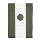 Södahl Star Damask juleduk i grønt, innpakket med elegant bånd og etikett 140x370