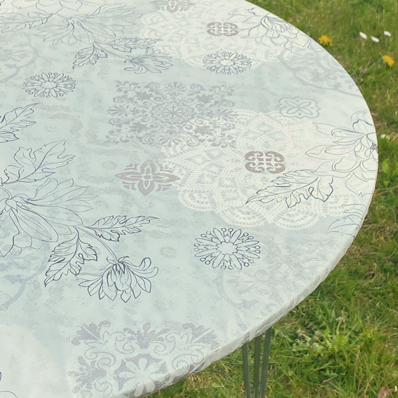 Skønne strekblomster i lyse farger - Rund voksduk med strikk