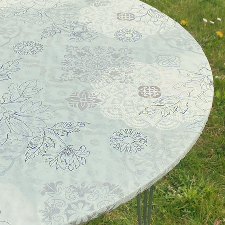 Skønne strekblomster i lyse farger - Rund voksduk med strikk