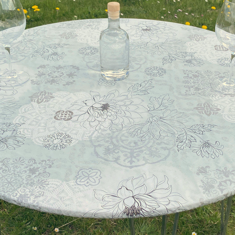 Skønne strekblomster i lyse farger - Rund voksduk med strikk