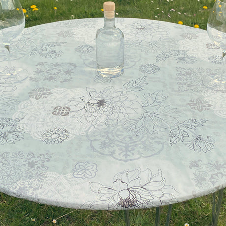 Skønne strekblomster i lyse farger - Rund voksduk med strikk