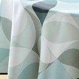 Nærbilde av Tessouro Sage-dukens tekstur og mønster i grønne og grå toner