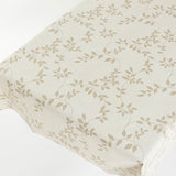 Linette Voksduk varm beige, linlook med blader, 140 cm bred