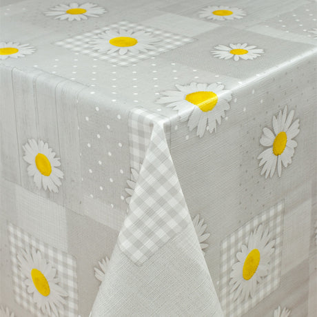 Prestekrager, prikker og lappeteppe – Rund voksduk med strikk