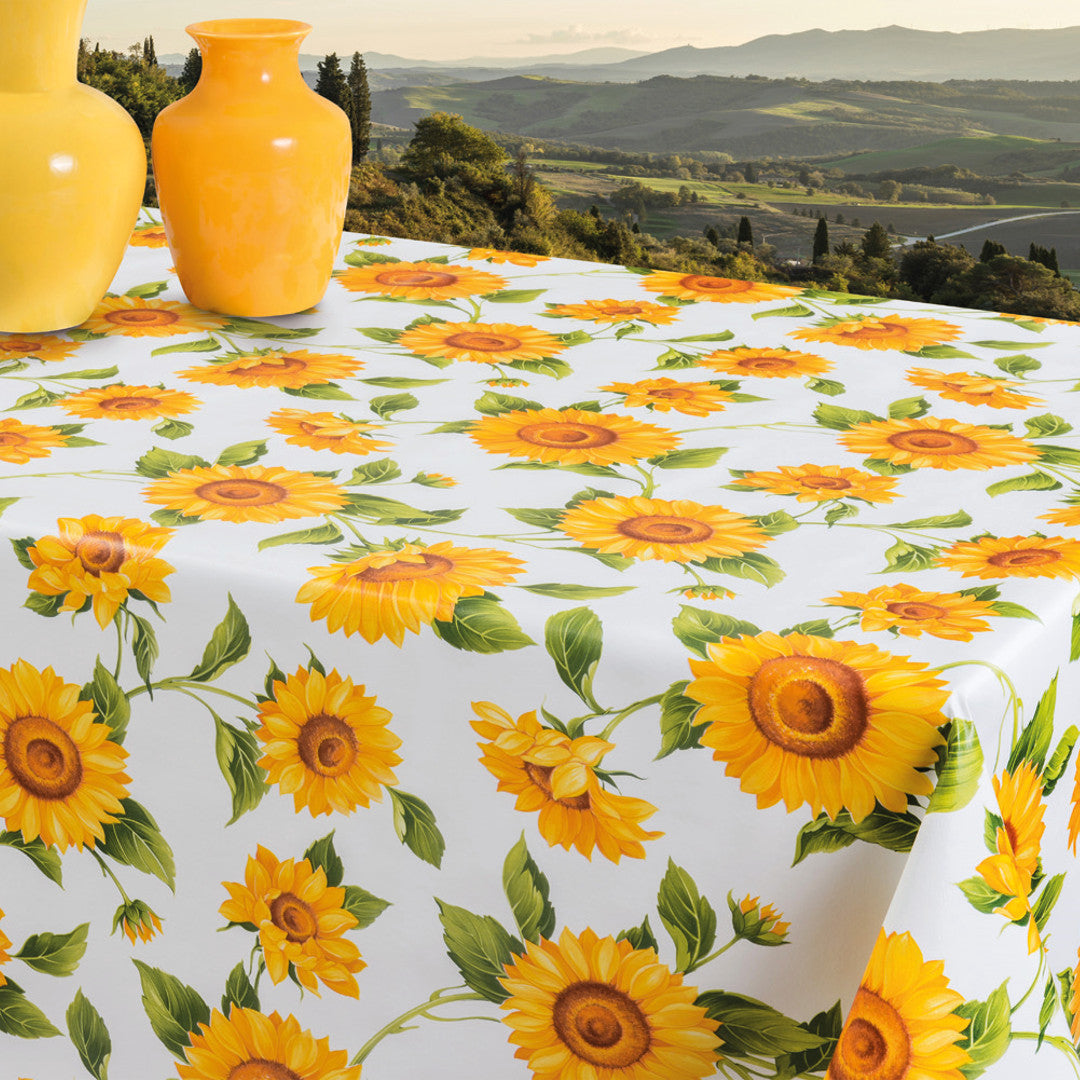 Solsikker – voksduk i gule og oransje farger på hvit bunn, 140 cm