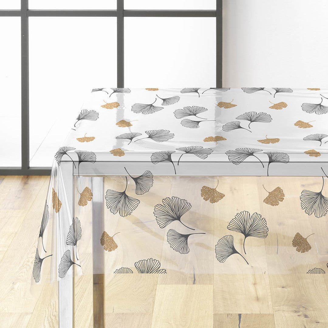 Ylisse – Gjennomsiktig voksduk med ginkgoblader i svart og gull, hjørne