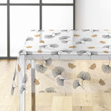 Ylisse – Gjennomsiktig voksduk med ginkgoblader i svart og gull, hjørne